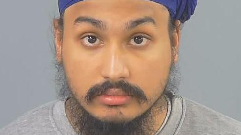 Vickrum Digwa,un hombre con barba y turbante. 